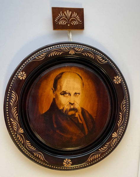 Wooden portrait of Shevshenko with carving