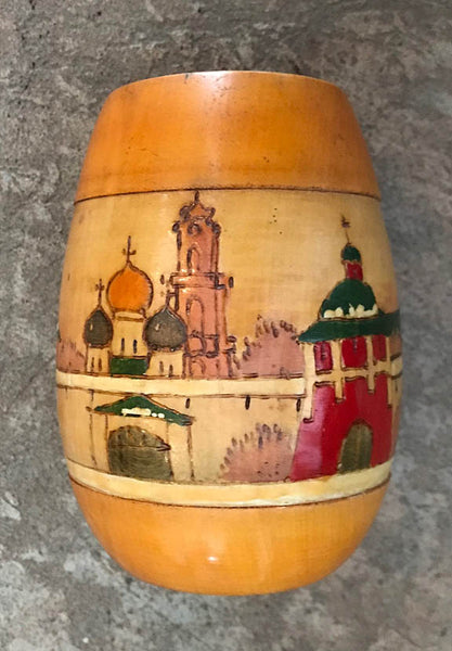 Carved and painted wooden vase