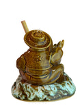 Kozak with cooking pot server