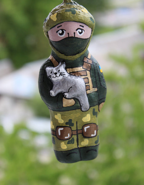 Souvenir "Defender with a cat"