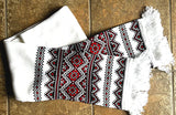 White knit scarf with red-black embroidery design