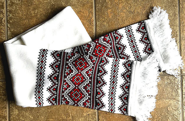 White knit scarf with red-black embroidery design