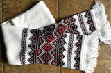 White knit scarf with red-black embroidery design