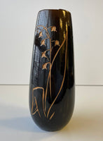 Authentic wooden vase with flower carving