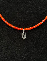 One string terracotta coral necklace, silver trident