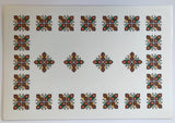 Laminated placemat with embroidery design